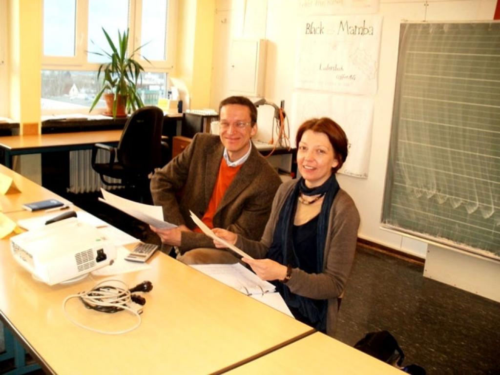 Frau Löffler und Herr Saalmüller - zwei ziemlich zufriedene Unternehmens-Coaches